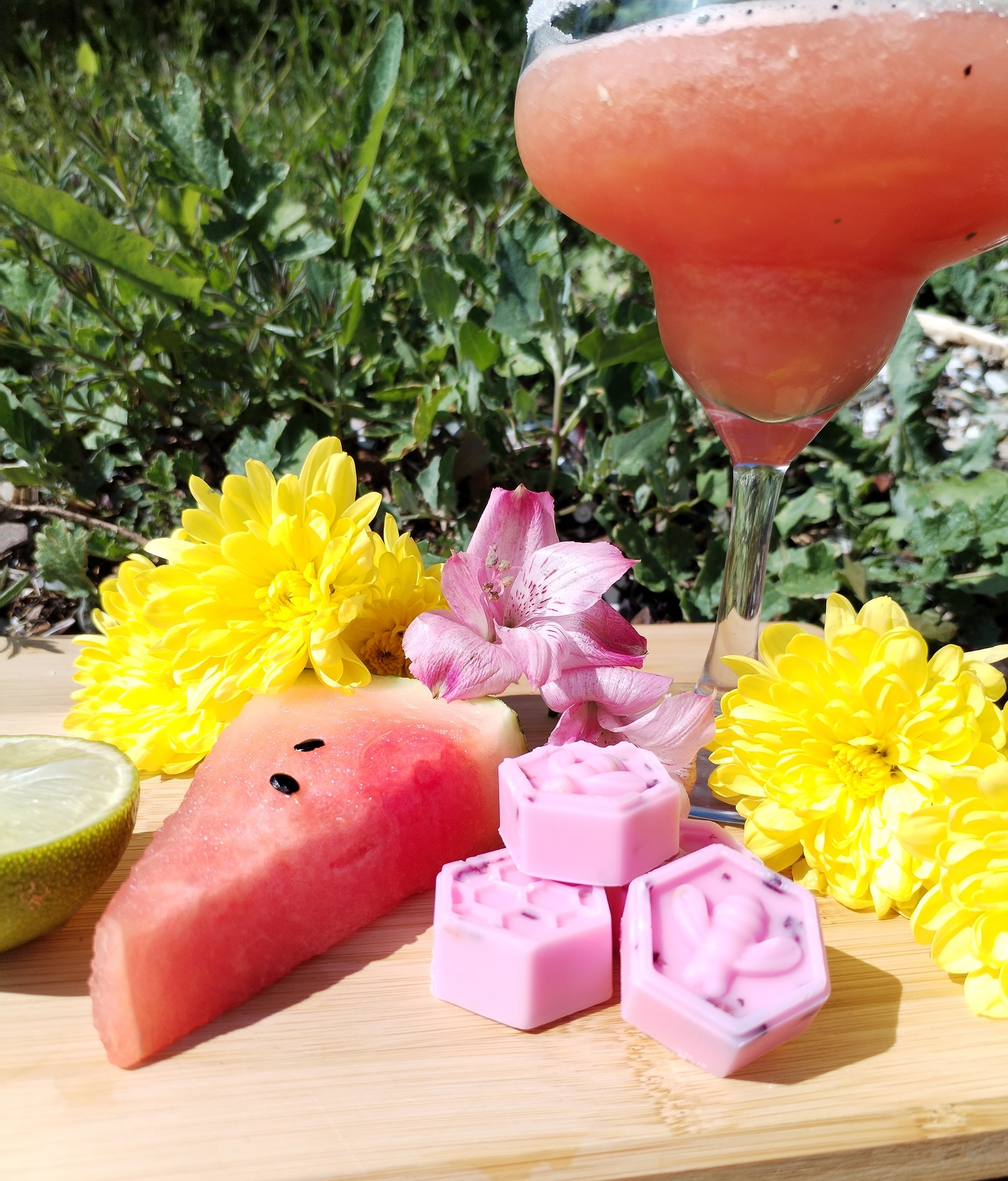 Watermelon Margarita Wax Melts with Honeycomb Bee, Fresh Watermelon Cocktail, Lime, and Vibrant Flowers on Bamboo Chopping Board - A Fusion of Refreshing Aromas and Mystical Serenity