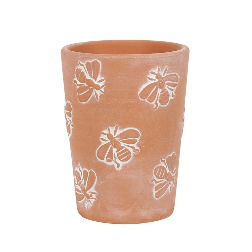 Close-up of Terracotta Bee Pattern Plant Pot: A detailed view of a terracotta plant pot adorned with bee patterns, showing the raised bees with subtle whitewash accents on the sides of the pot.