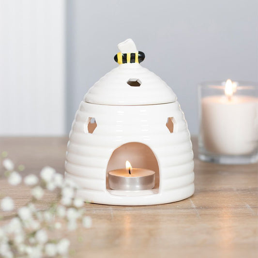 White Beehive Wax Melts and Oil Burner with Lit Tealight - Charming Allure on Wooden Table with White Candle