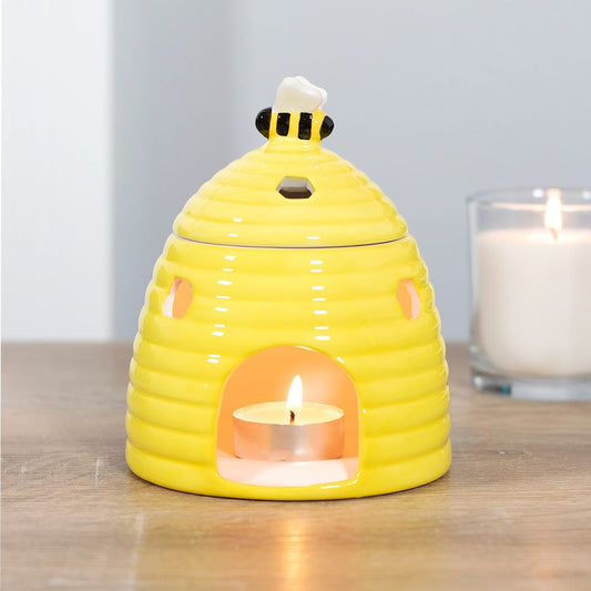 Yellow Beehive Wax Melts and Oil Burner with Lit Tealight - Charming Allure on Wooden Table with White Candle