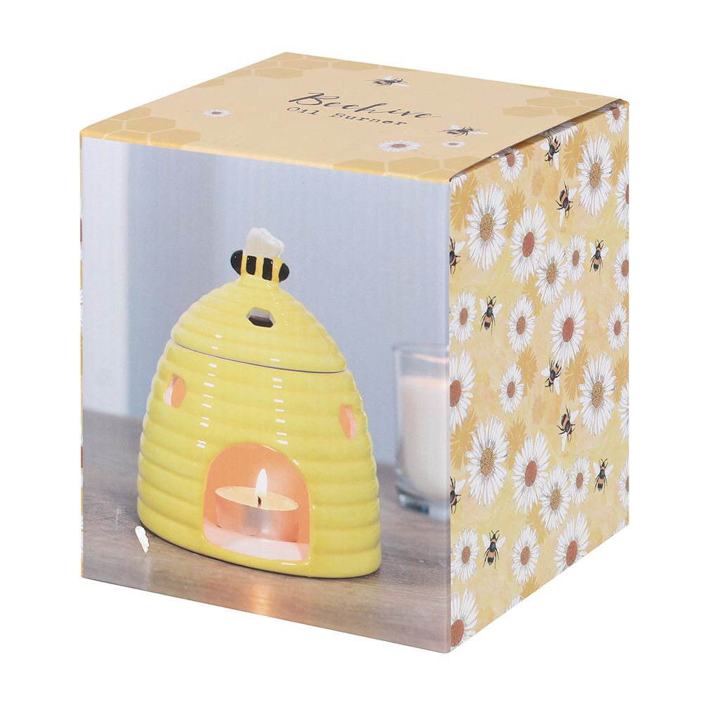 Yellow Beehive Burner: Box Packaging with Angle View, Image of burner with lit tealight and candle Printed, Yellow Background with White Flower and bees Design